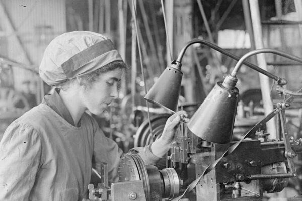 Image IWM (Q 20074) Photo of woman worker Operating an automatic index graduating machine