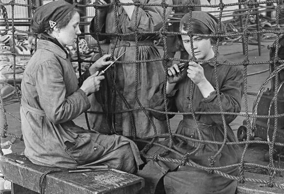 Splicing Cargo Netting Photo of women workers splicing cargo netting