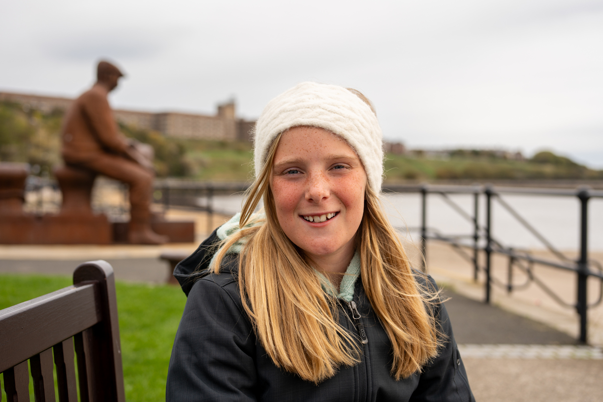 Ivy at the Fishermen's Statue on Fiddler's Green